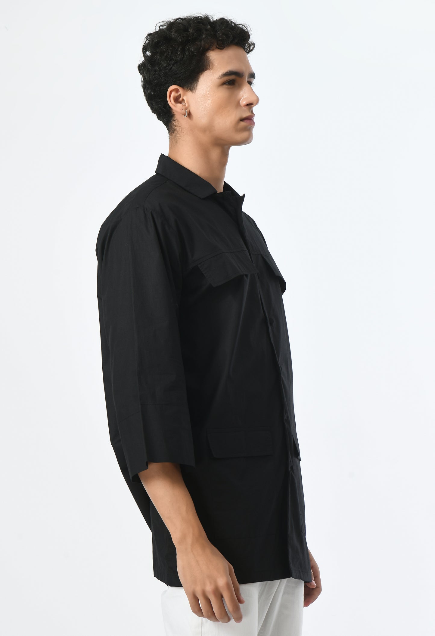 Unisex black regular-fit shirt.