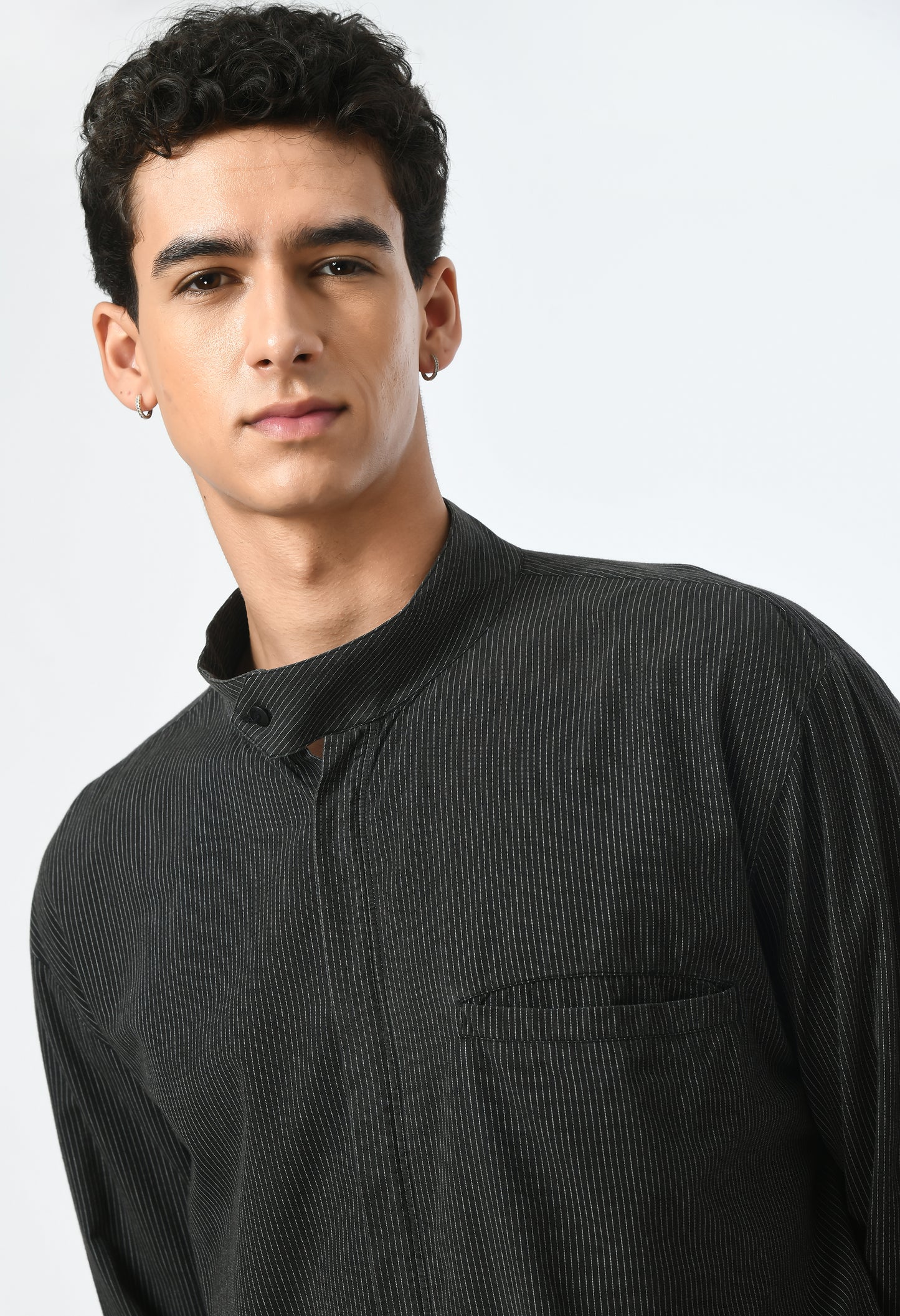 Men's charcoal shirt adorned with white stripes.