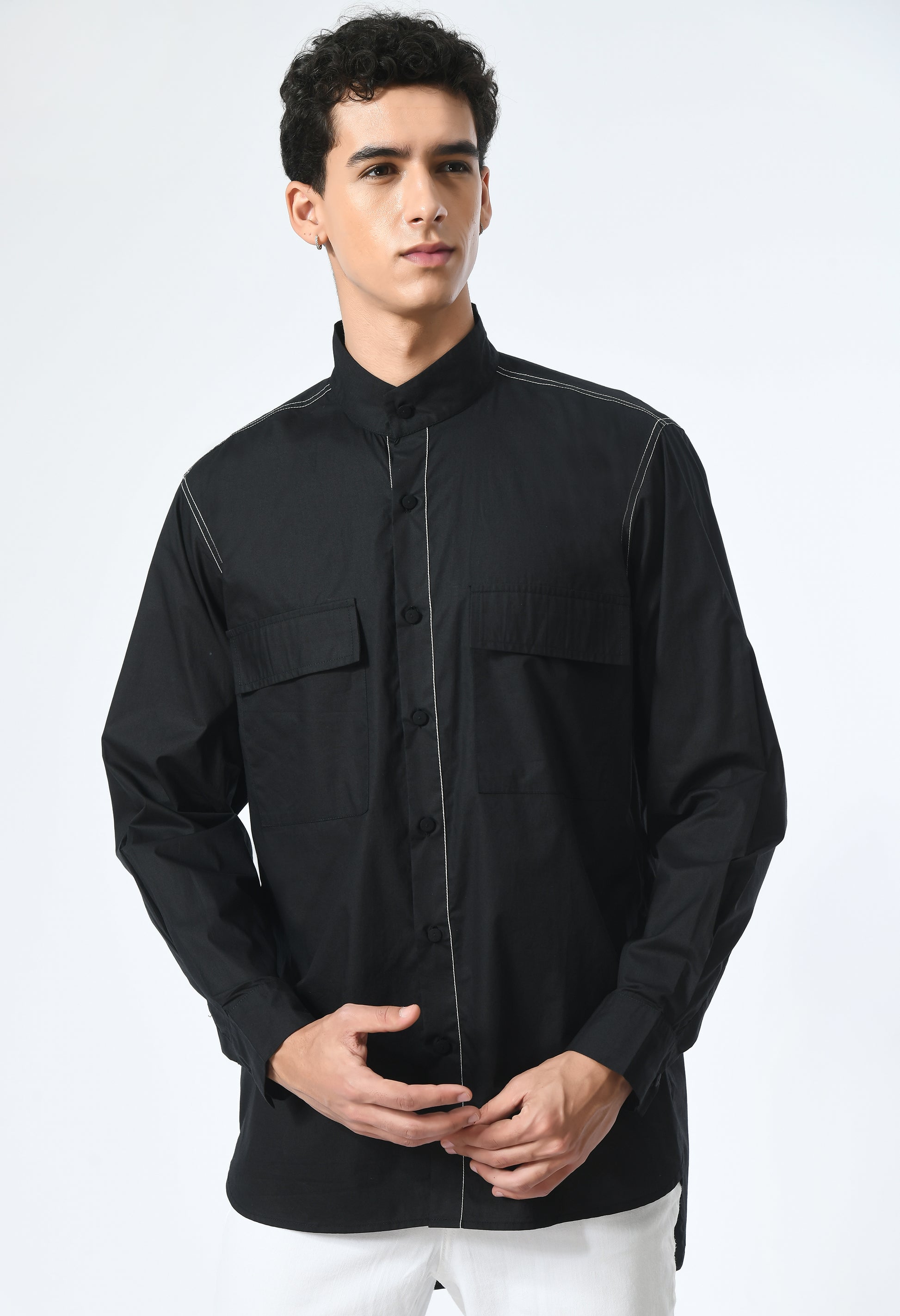 Marked in Black shirt