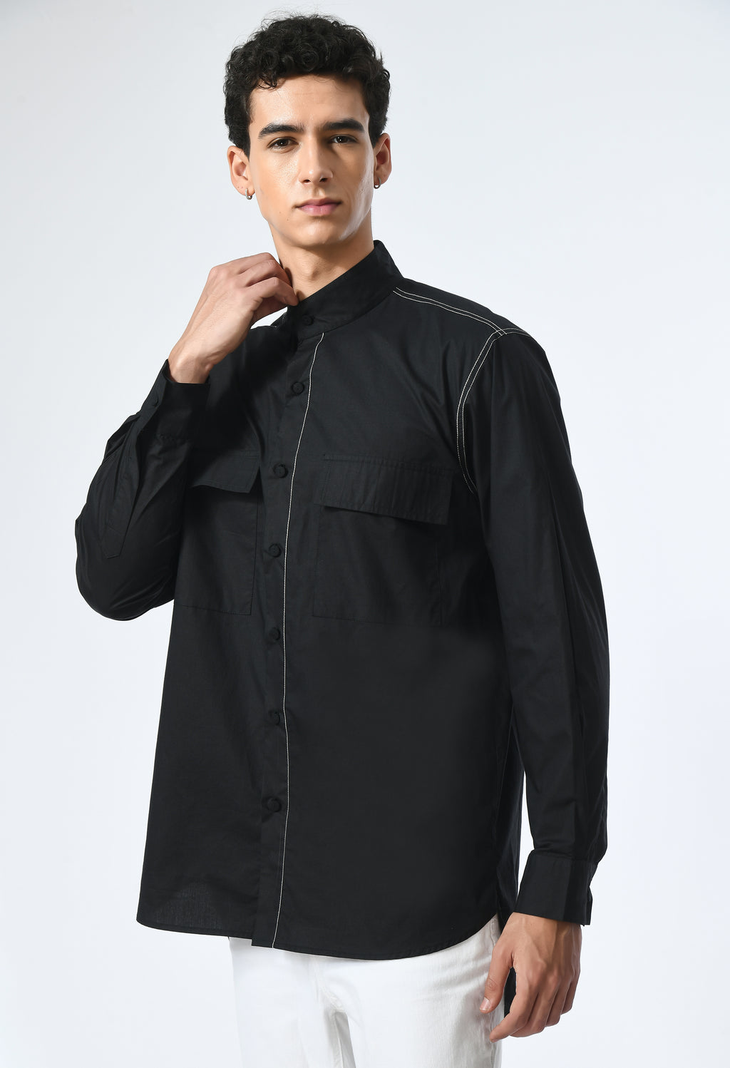 Marked in Black shirt