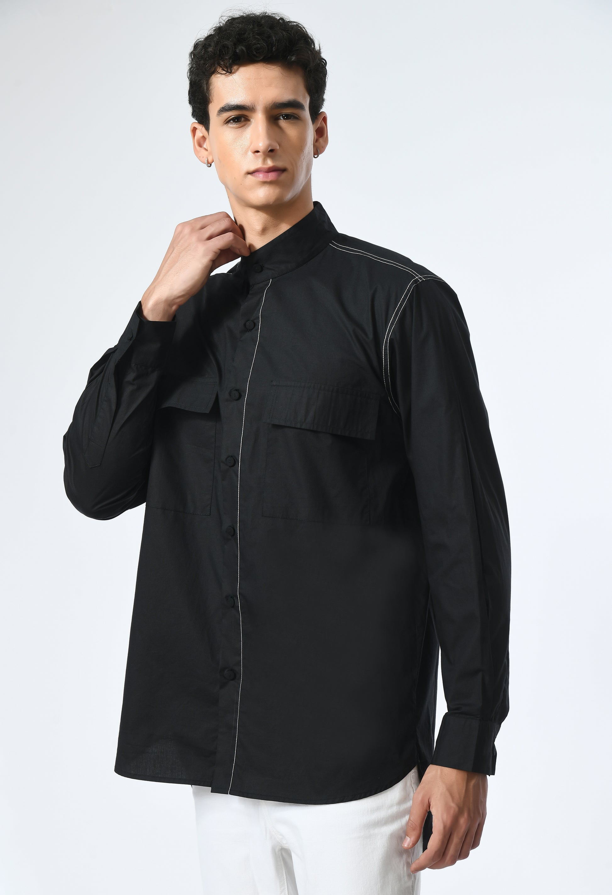Marked in Black shirt