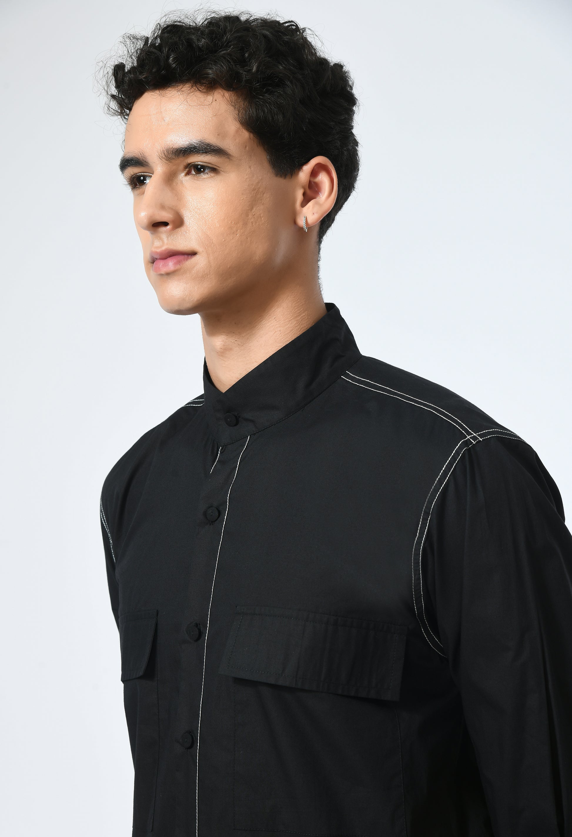 Marked in Black shirt