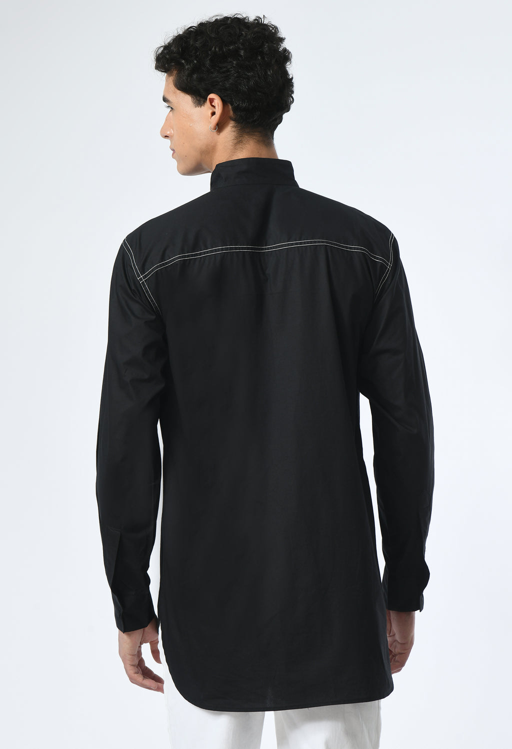 Marked in Black shirt