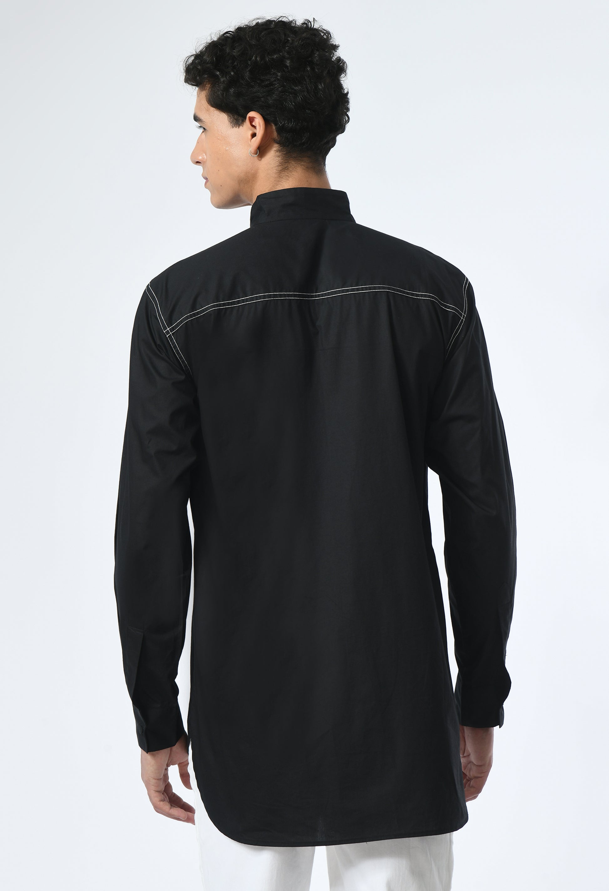 Marked in Black shirt