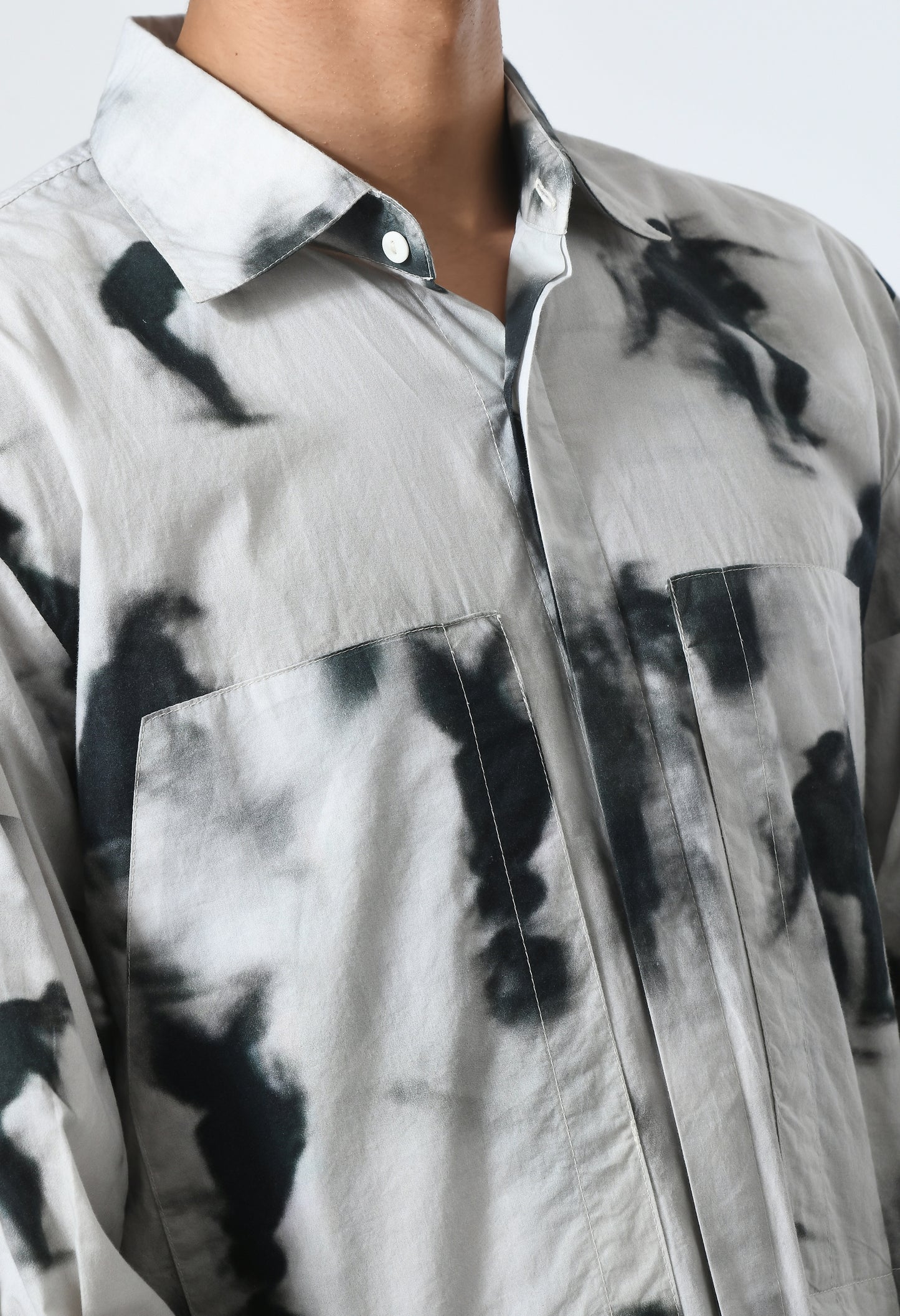 Unisex regular-fit shirt featuring tie-dye effect.