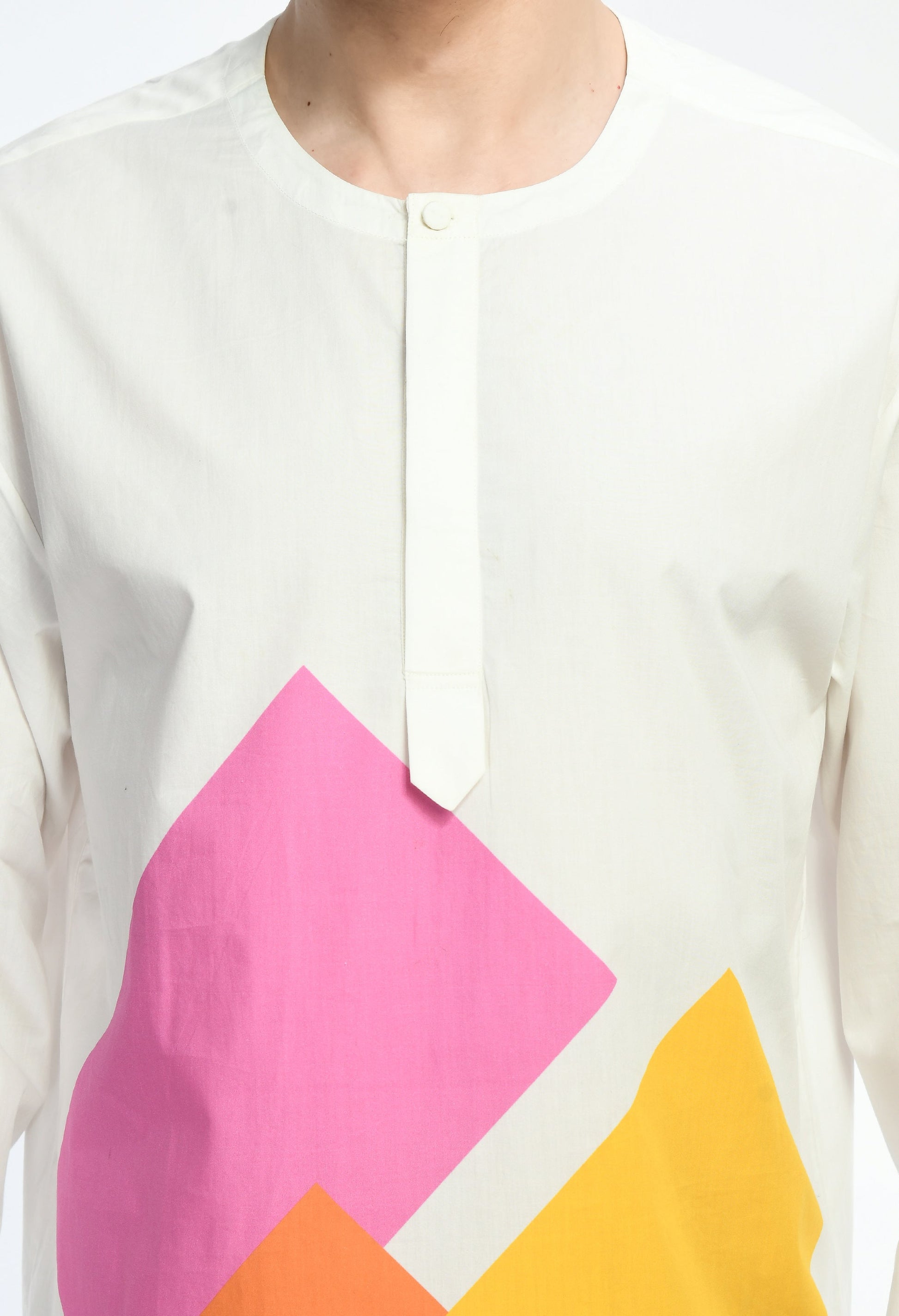 Color code shirt with bold abstract prints on soft cotton fabric.