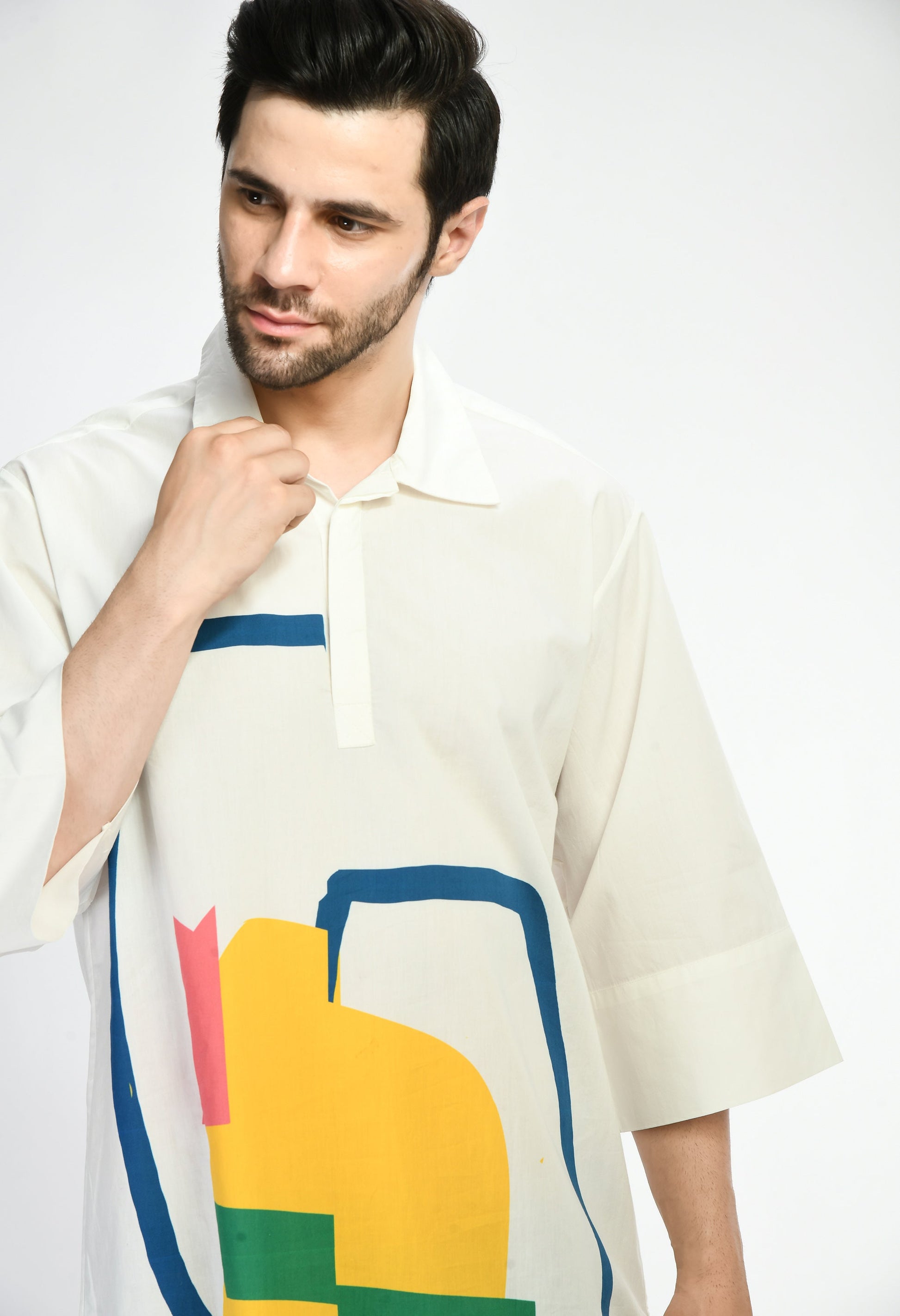 Colorful Pixel Pop Shirt with bold geometric prints, made from soft cotton for a modern touch.