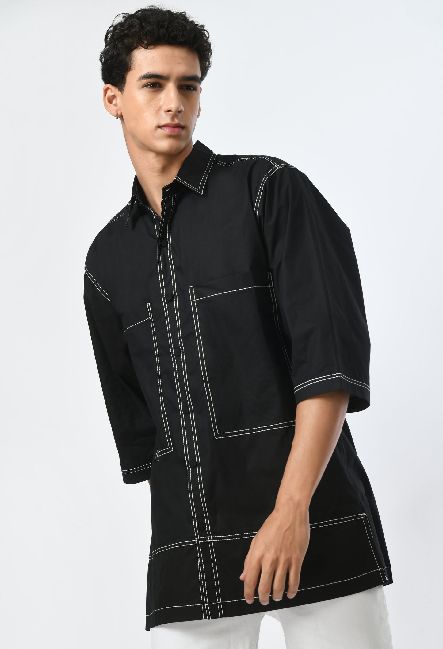 Black unisex shirt with a classic collar.