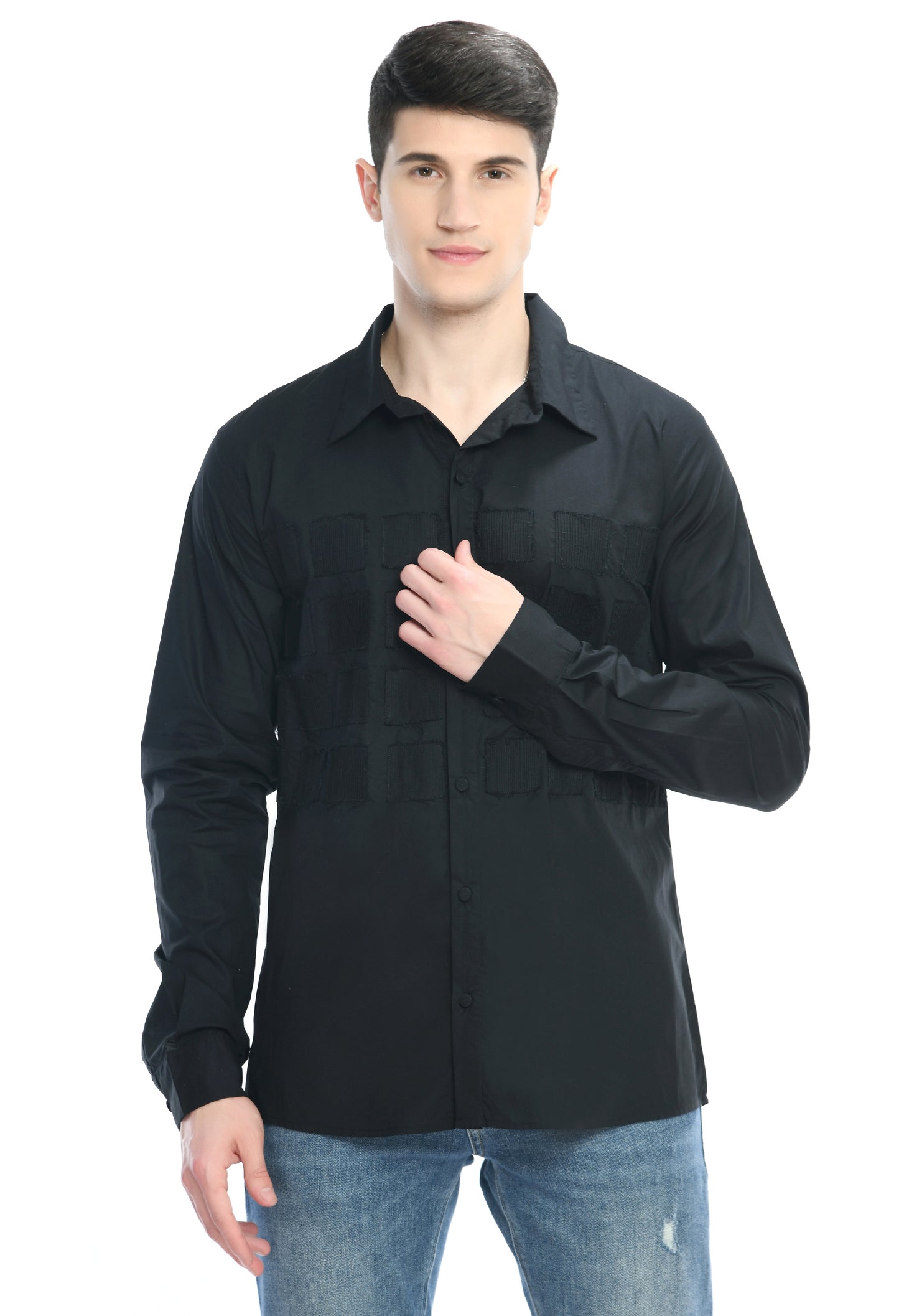 A black cotton shirt showcasing tone on tone appliqué work in form of small square cut design.