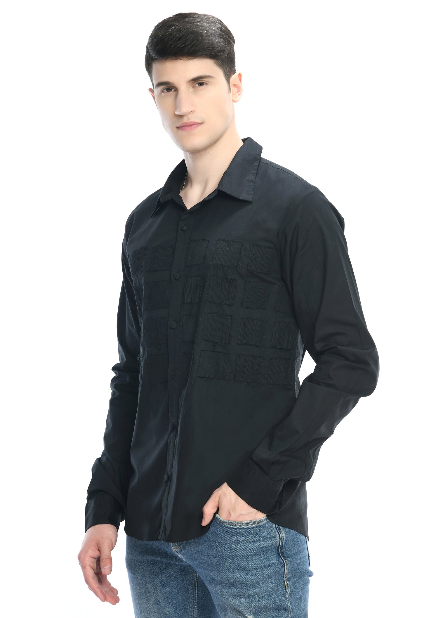 A black cotton shirt showcasing tone on tone appliqué work in form of small square cut design.