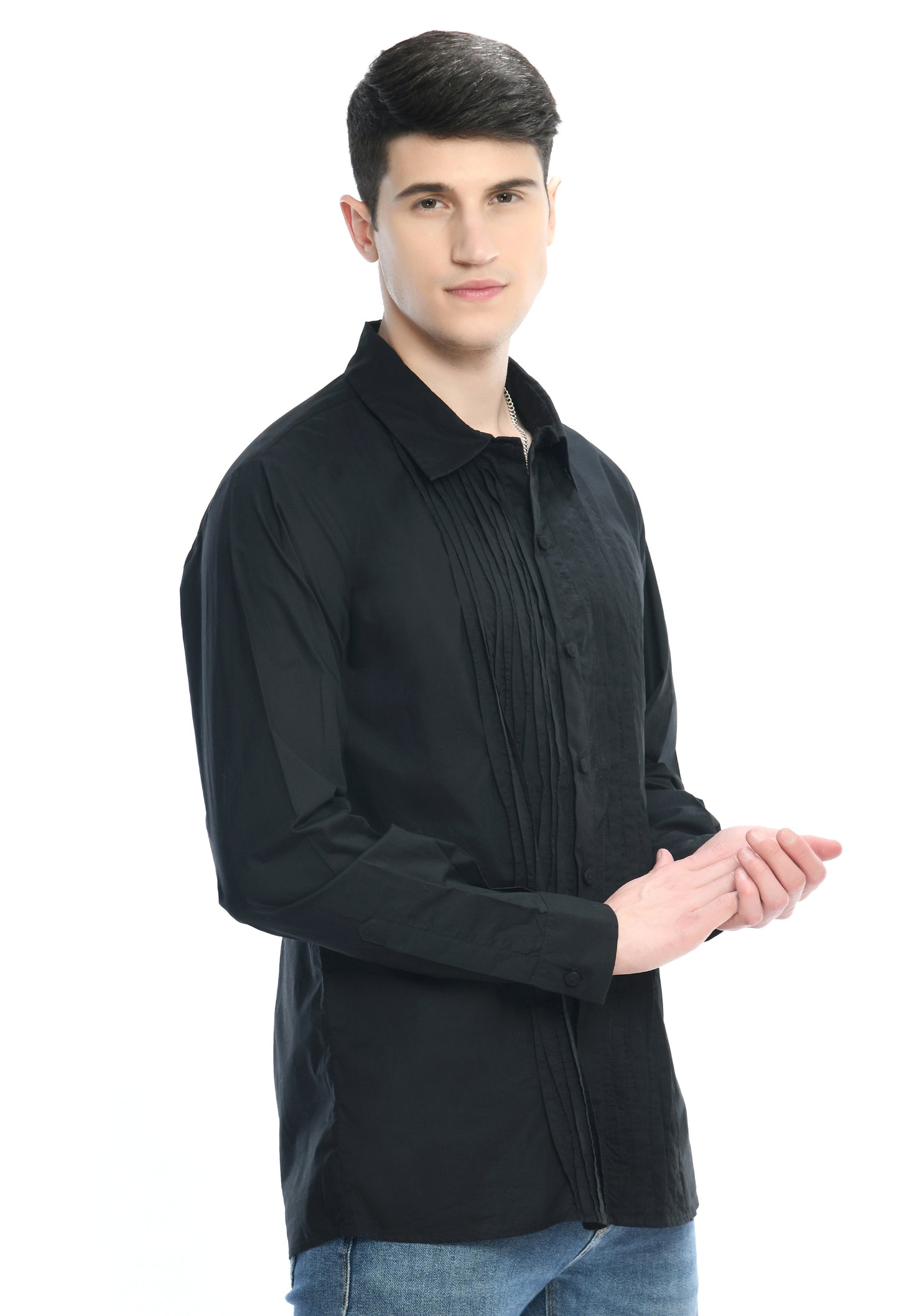 A black cotton shirt showcasing asymmetric pintex in the front