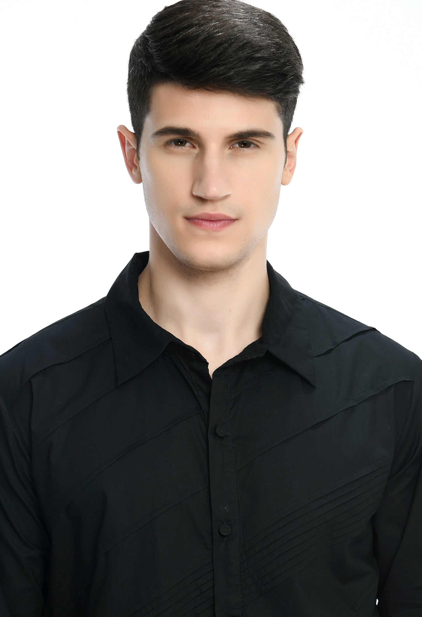 A black cotton shirt showcasing pintex lines in the front in diagonal pattern.