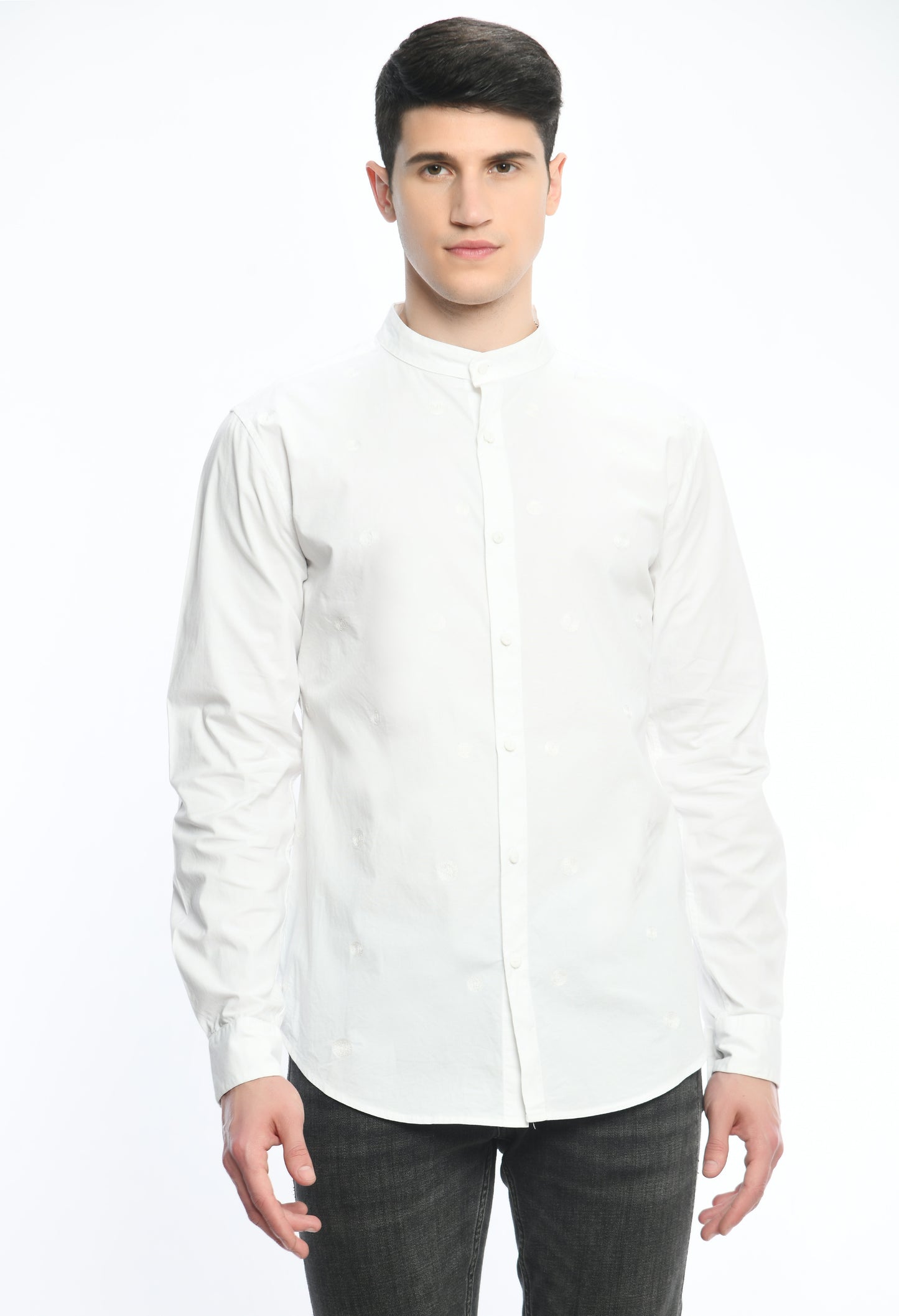 A white cotton shirt with band neckline, showcasing tone on tone thread embroidery