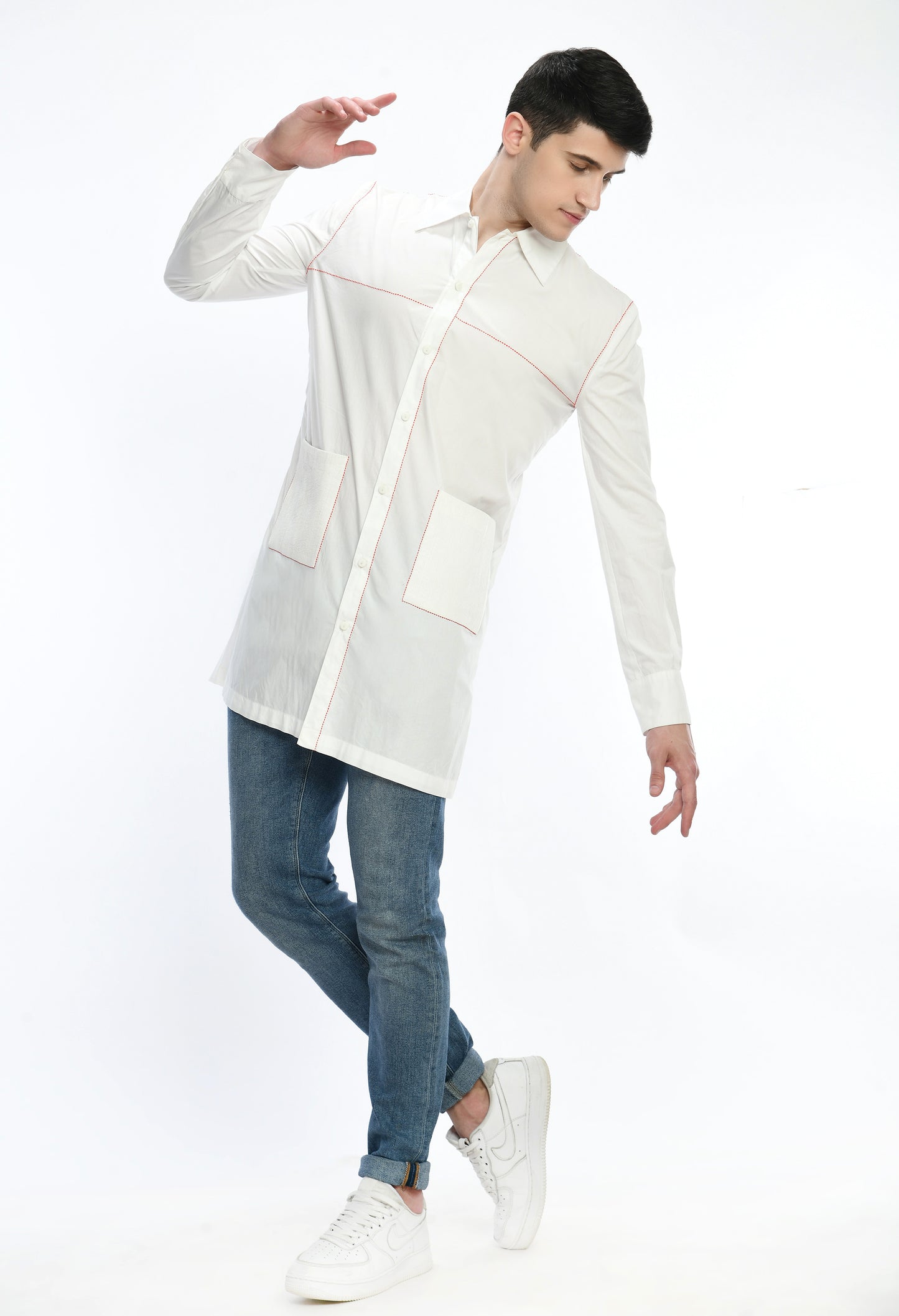 A white cotton shirt with Kantha thread work & pintex pockets