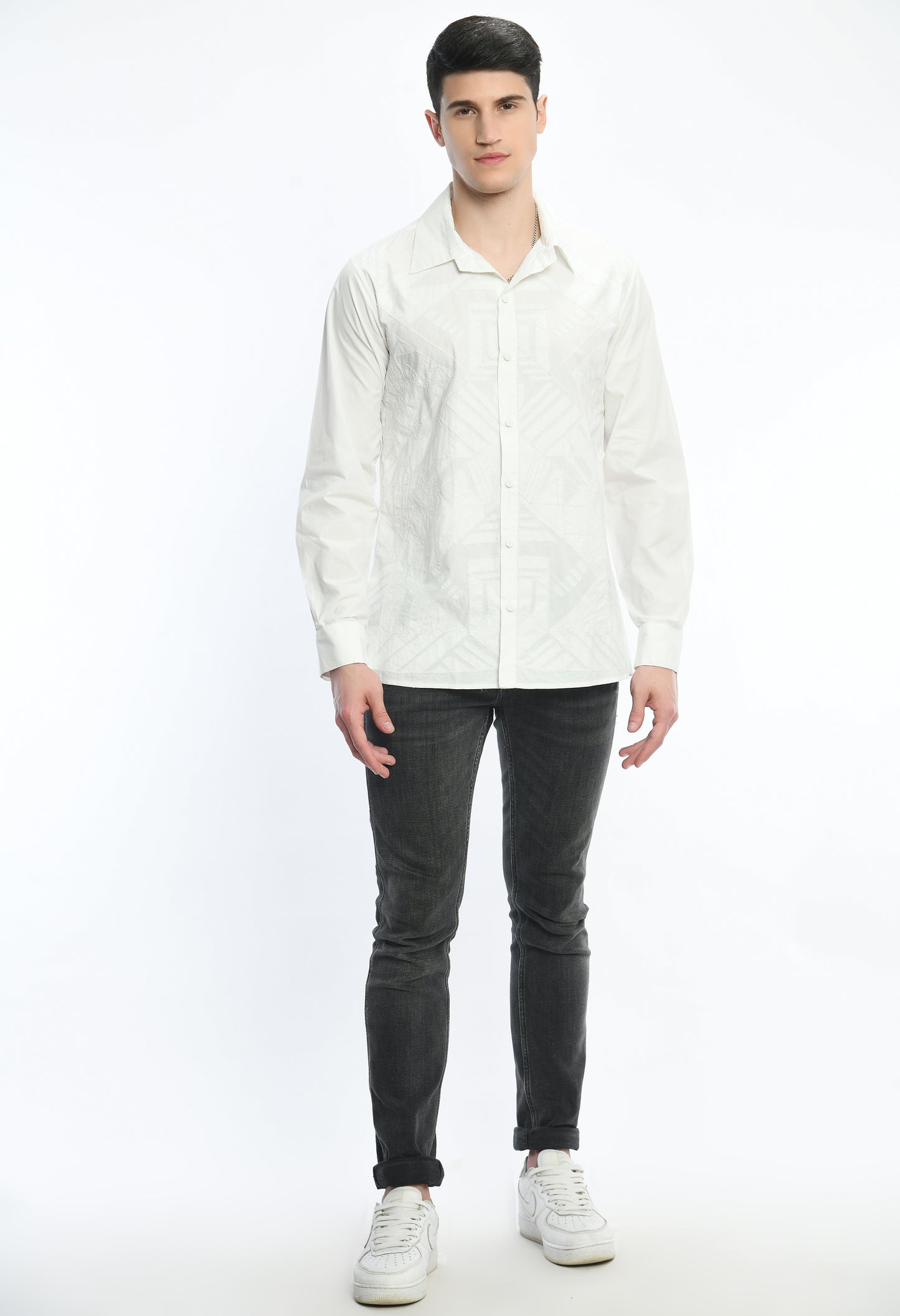 A White cotton shirt showcasing tone on tone appliqué work