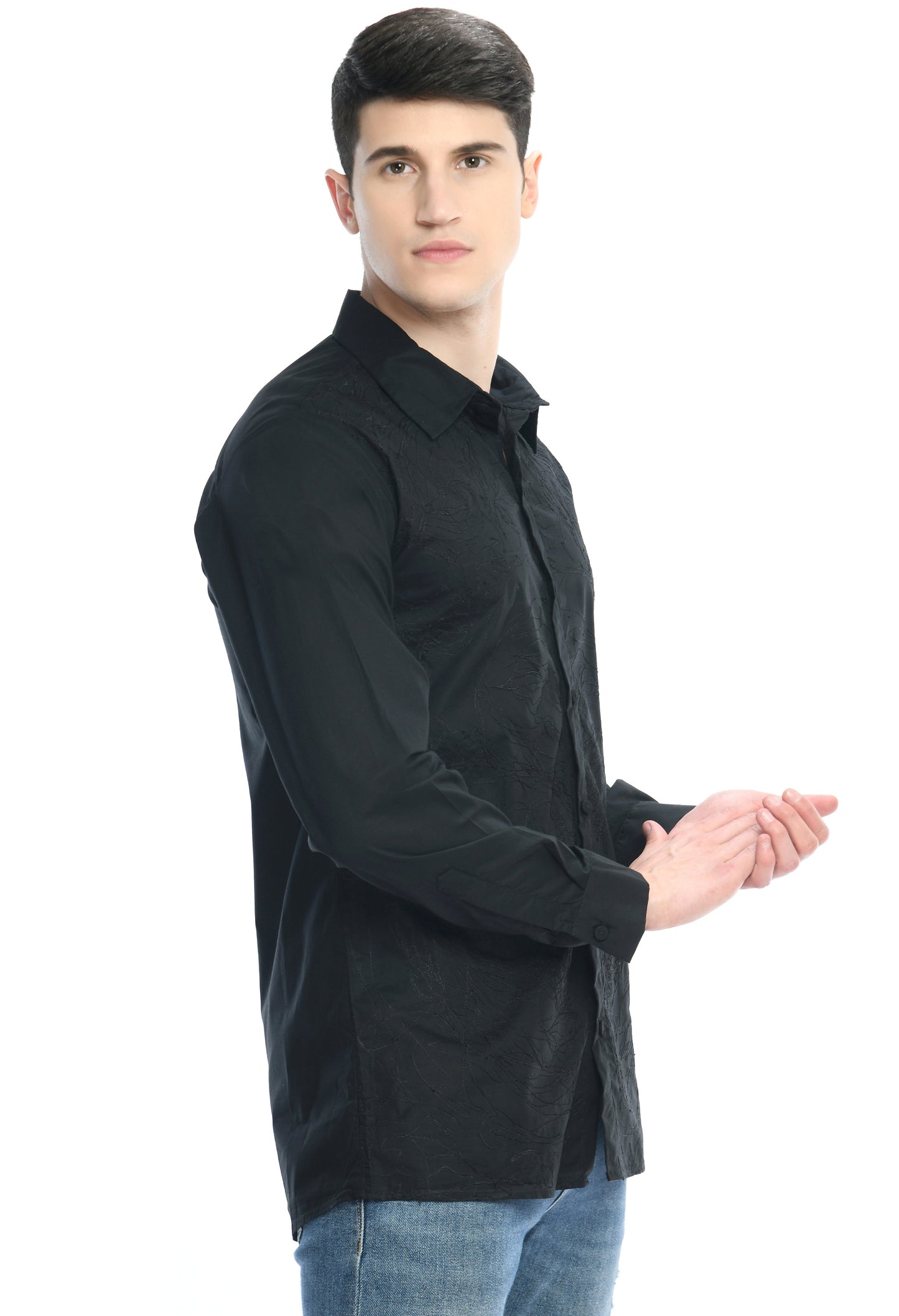 A black cotton shirt showcasing tone on tone abstract thread embroidery