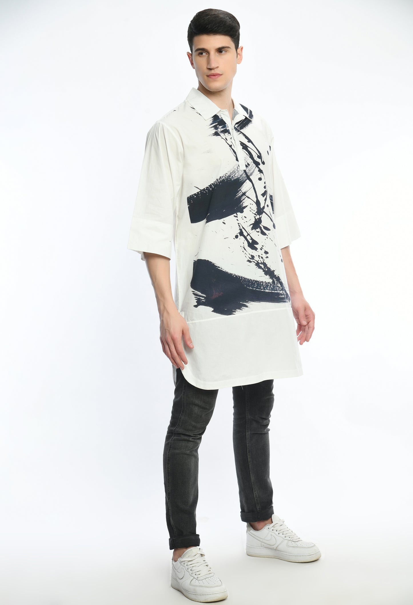 White, stylish,lose-fit, long cotton shirt with digital print on it