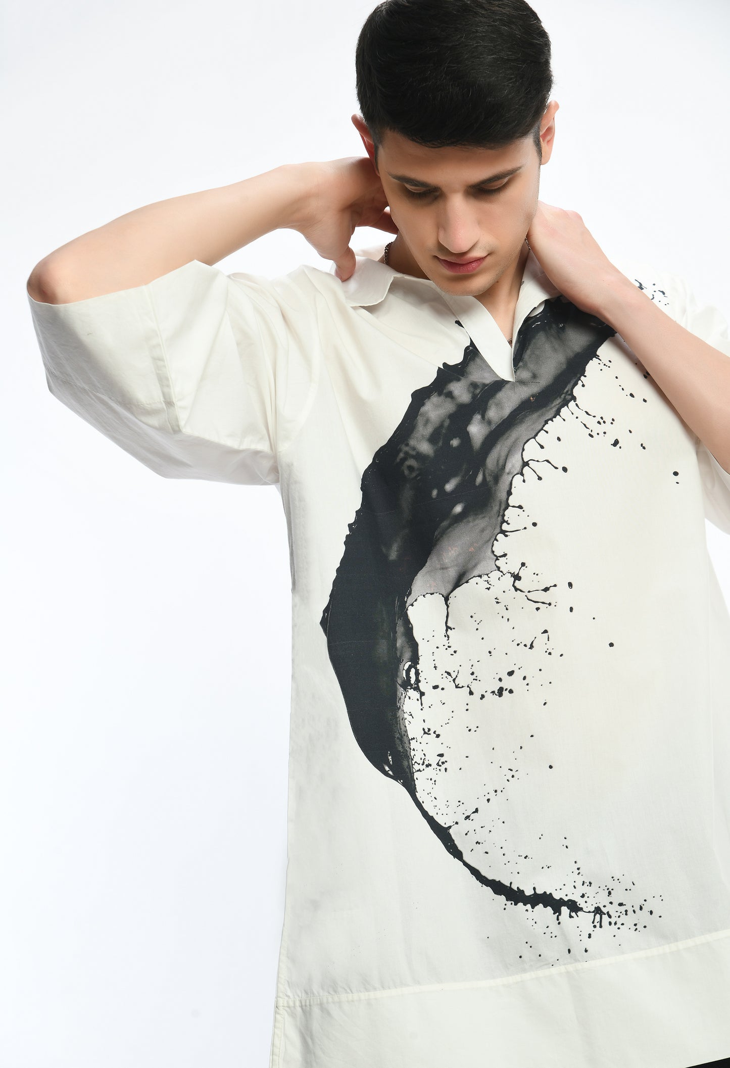 White, stylish, lose-fit, cotton shirt with digital print on it