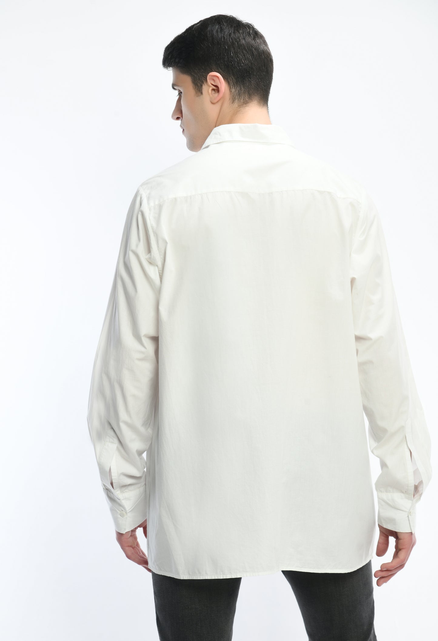 White, stylish, lose-fit, cotton shirt with digital print on it